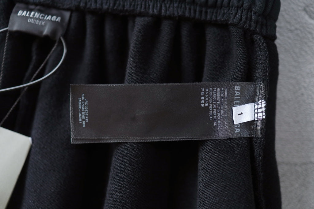 Balenciaga shorts with hang tag and care label on front waistband