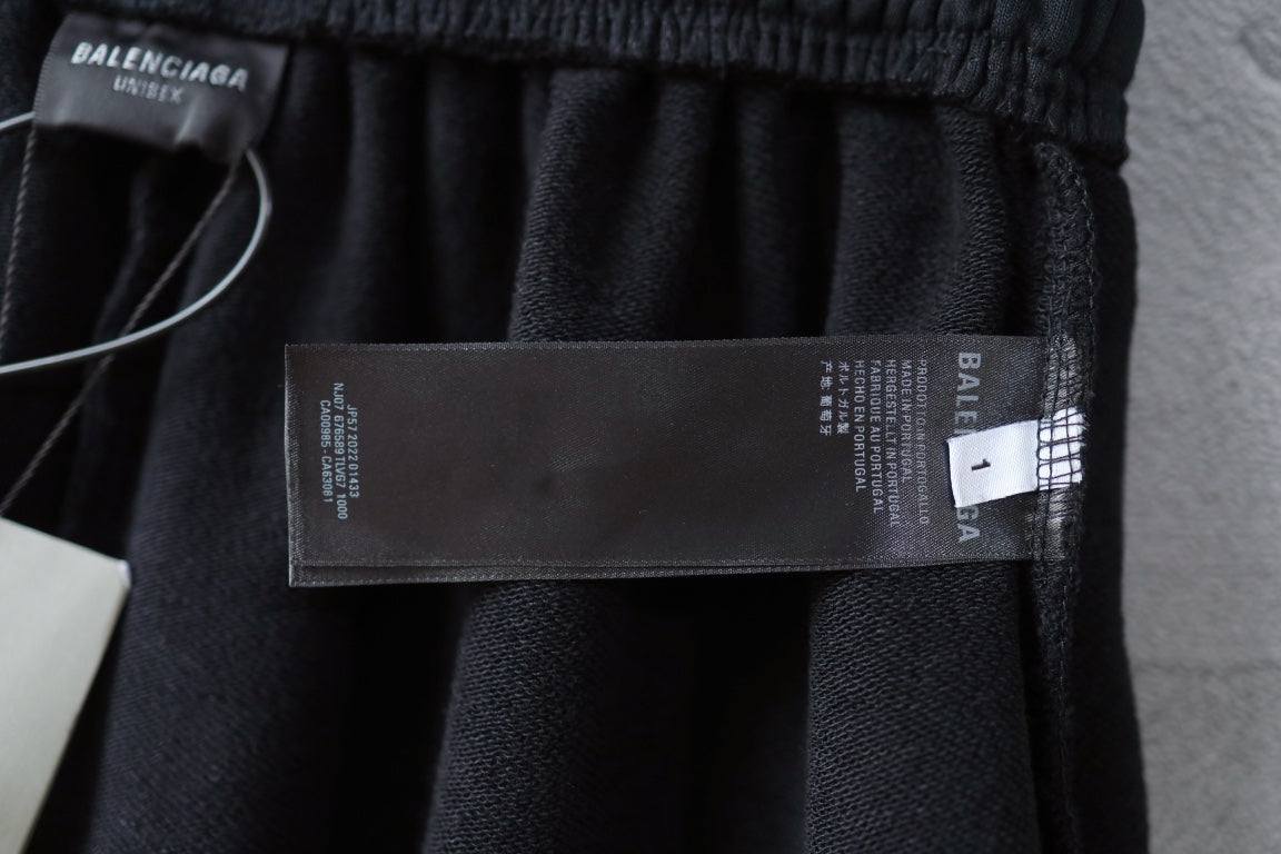 Balenciaga shorts with hang tag and care label on front waistband