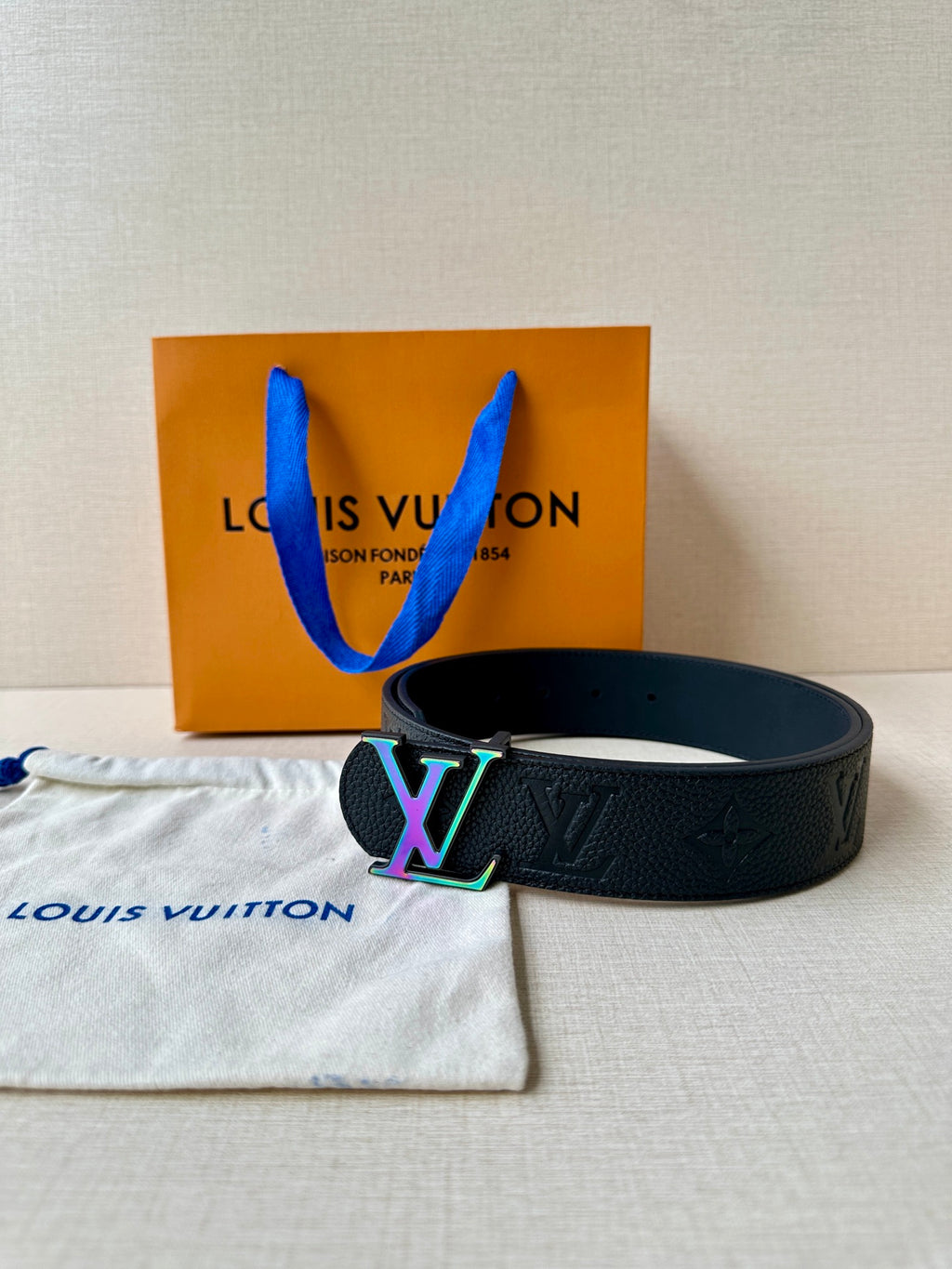 Textured leather belt with dark finish and multicolor LV buckle with dust bag