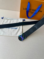 Dark leather belt with LV monogram texture and multicolor buckle laid on pouch