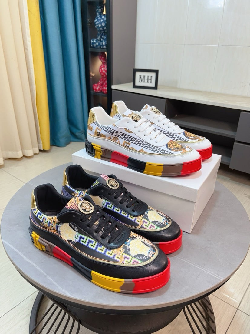 Versace luxury sneakers set: white with gold crest print, black with logo trim.
