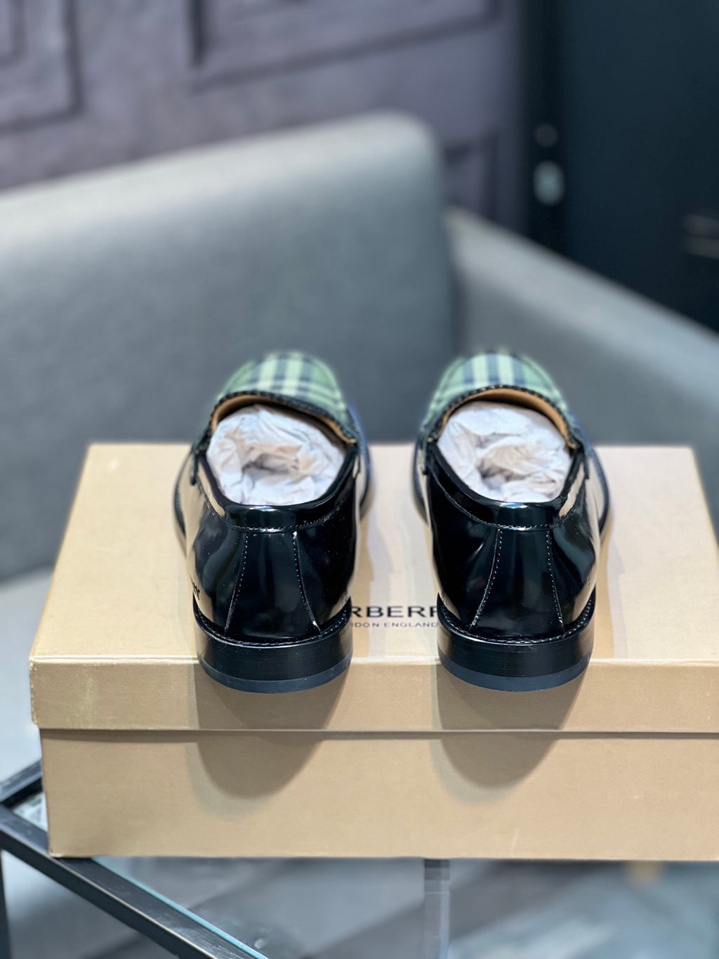 Burberry plaid loafers, back view with black leather heels and green tartan details