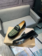 Burberry plaid loafers, side view with black leather finish and green tartan detail