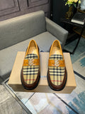 Brown leather loafer with tan plaid panel and gold buckle detail, round toe