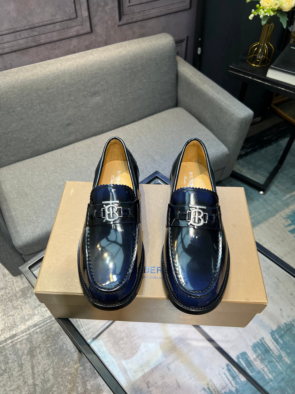 Burberry navy patent leather loafers with TB buckle detail, glossy finish