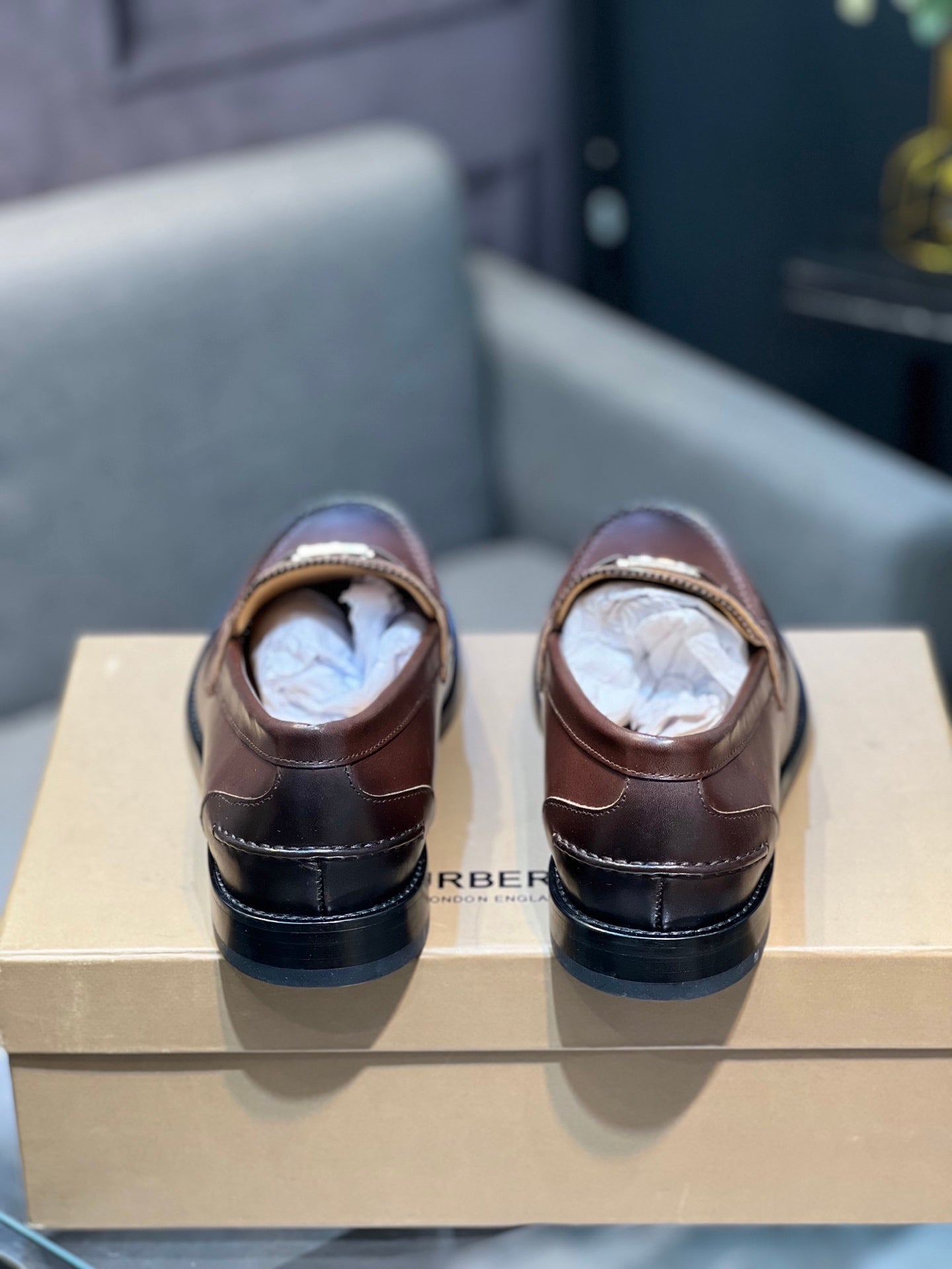 Brown leather loafers with TB hardware on toe and heel view