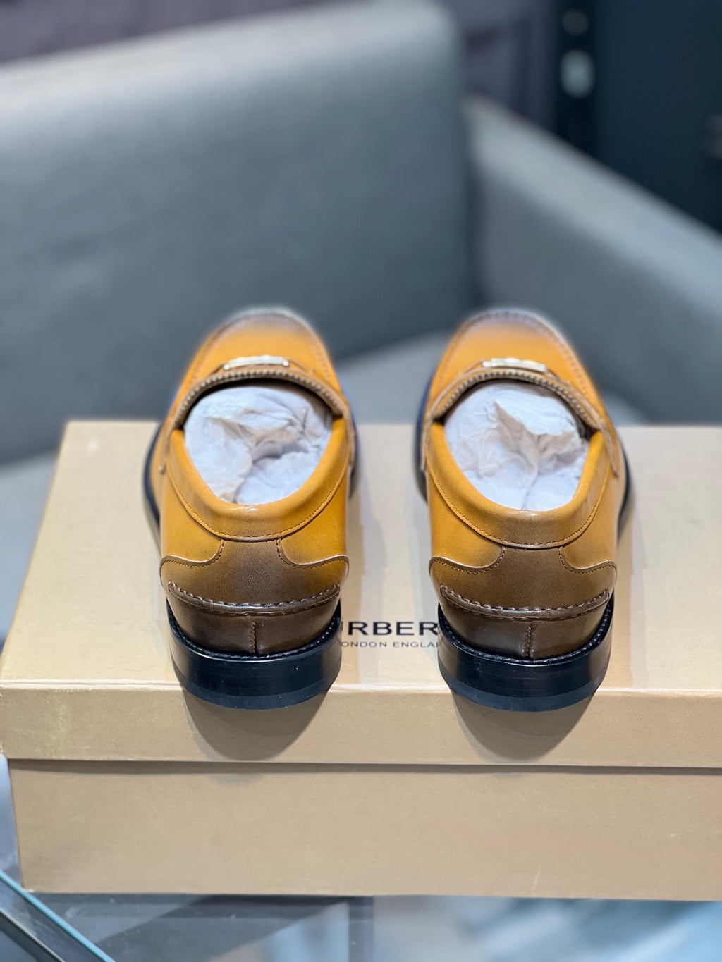 Burberry tan leather loafers with cushioned insoles and TB logo detail