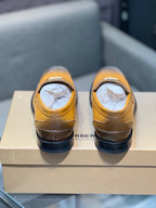 Burberry tan leather loafers with cushioned insoles and TB logo detail