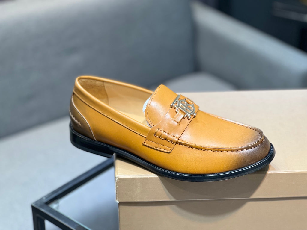 Burberry tan leather loafer on box, TB metal bit and black sole trim