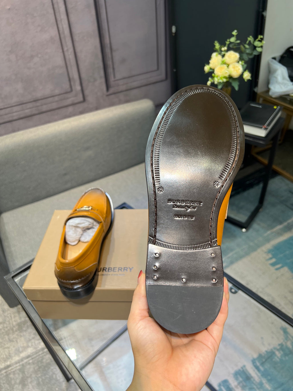 Burberry loafer outsoles, dark rubber with raised tread and brand text