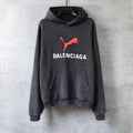 Charcoal gray Balenciaga hoodie sweatshirt with front pocket and red logo graphic