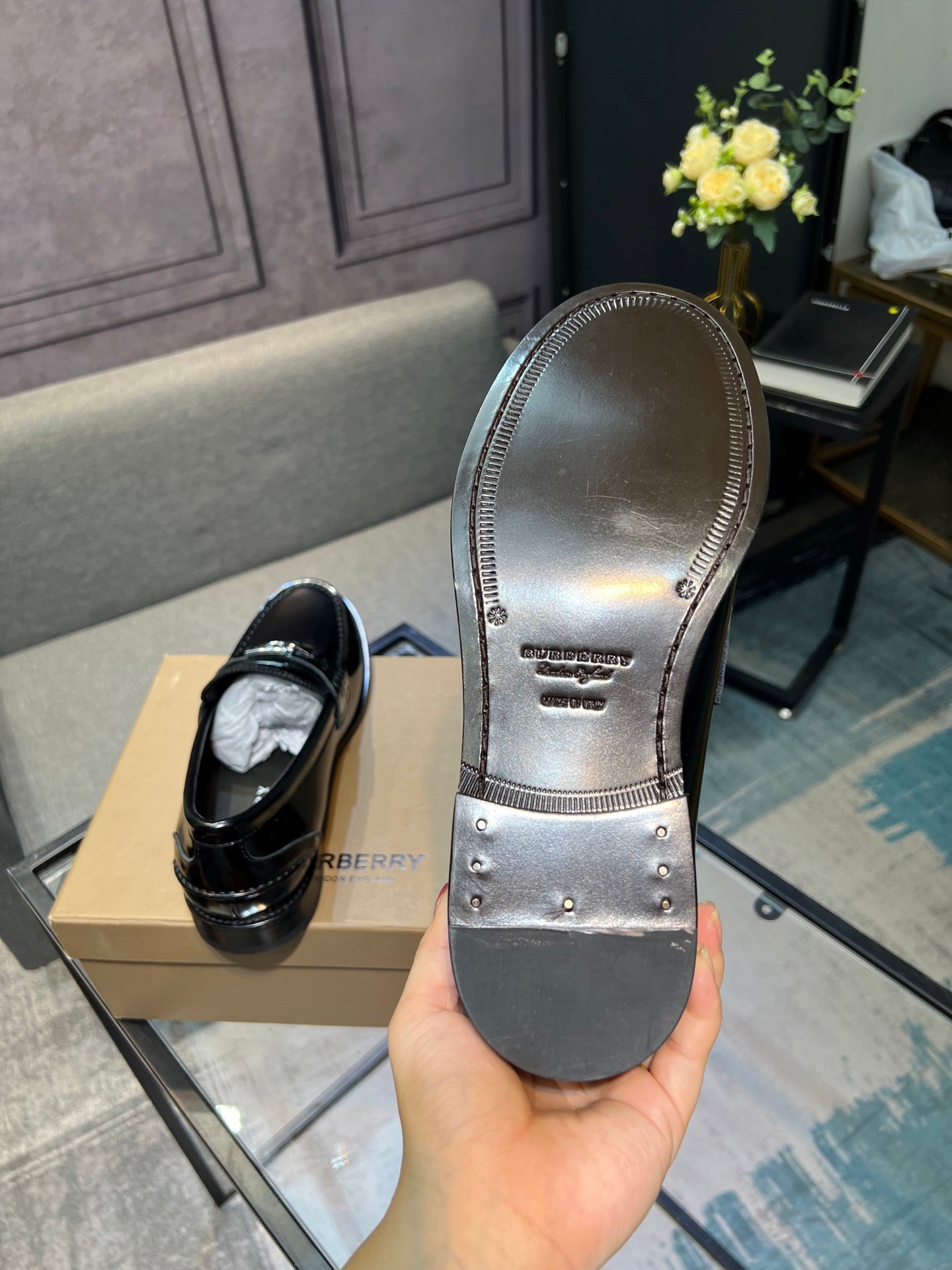 Black leather loafer sole and heel bottom view with stitched edge