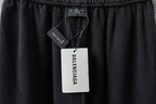 Balenciaga hang tag on elastic-waist dark gray pants