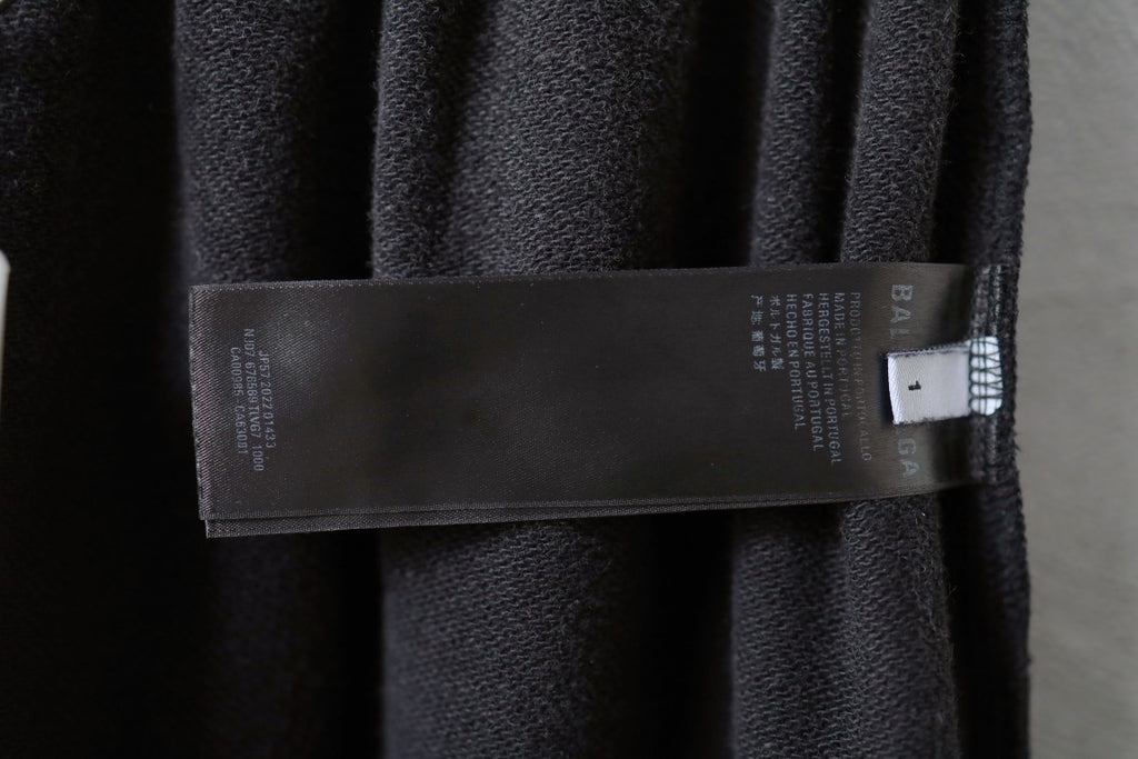 Interior size label on dark gray pants