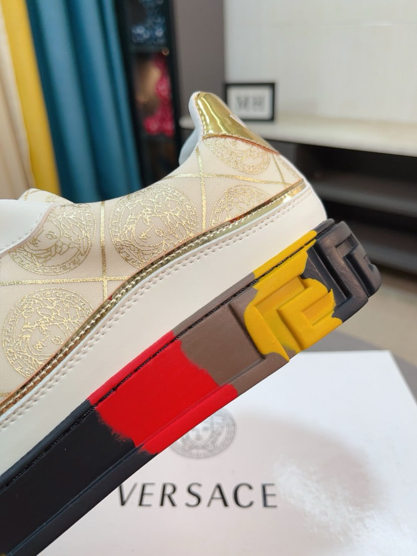 Close-up of white and gold sneaker side with high-contrast multicolor platform sole