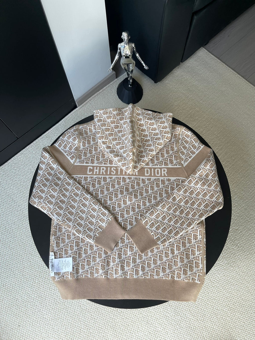 Beige hooded jacket with geometric logo pattern and Christian Dior logo on chest