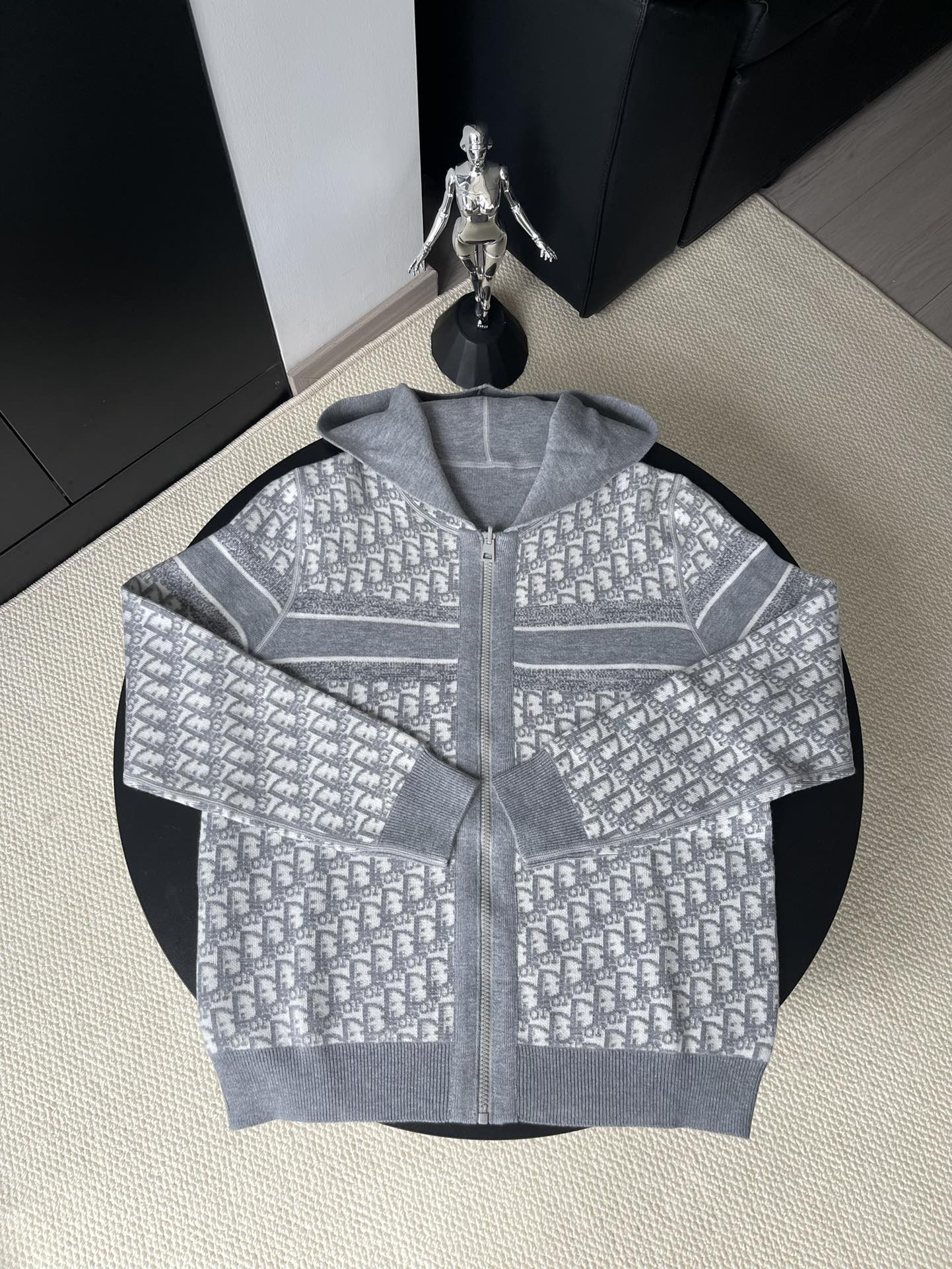 Gray zip-up hoodie with allover Dior-style monogram pattern and front zipper