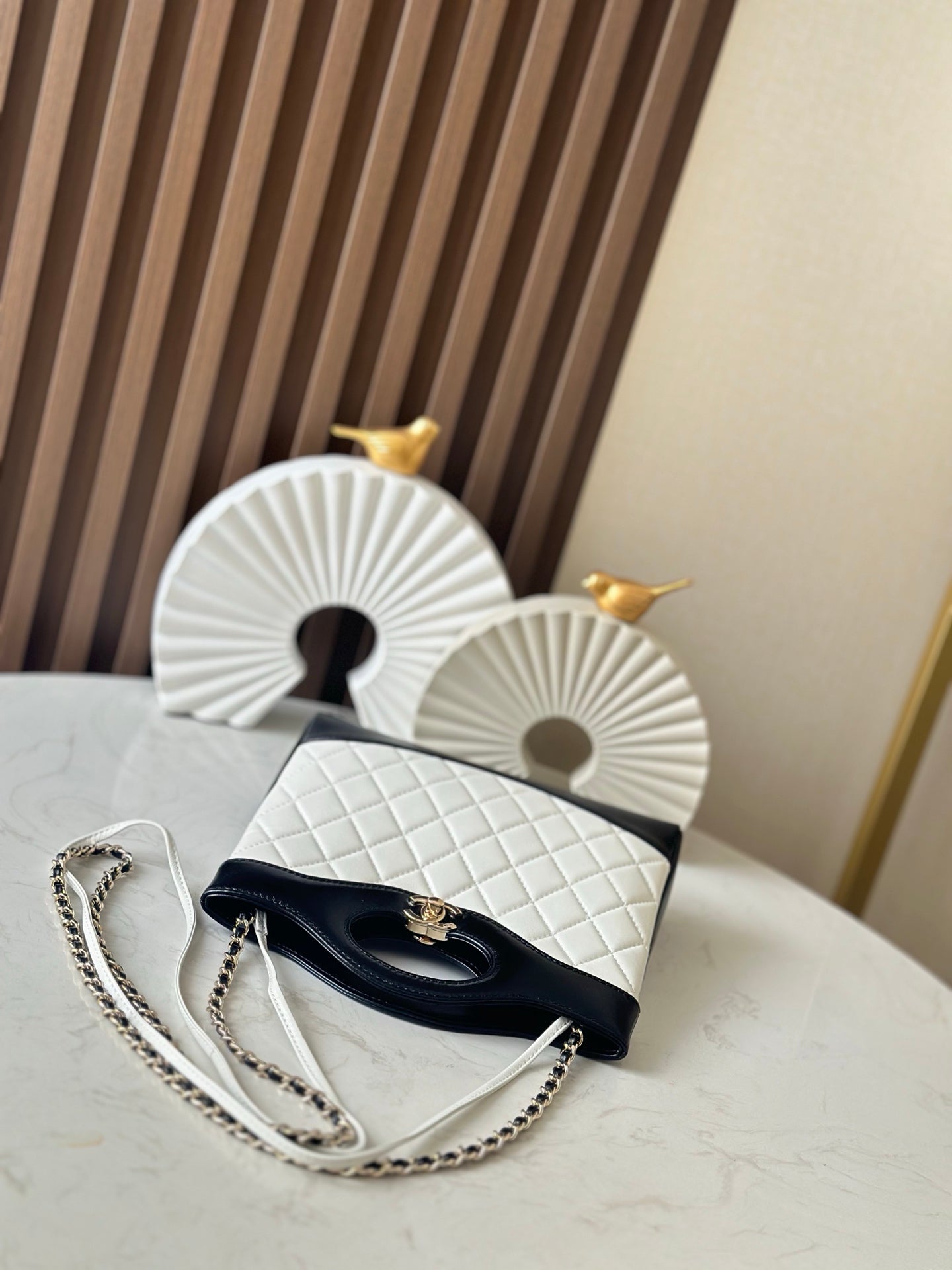 Chanel quilted mini bag with chain strap, black flap and gold CC clasp