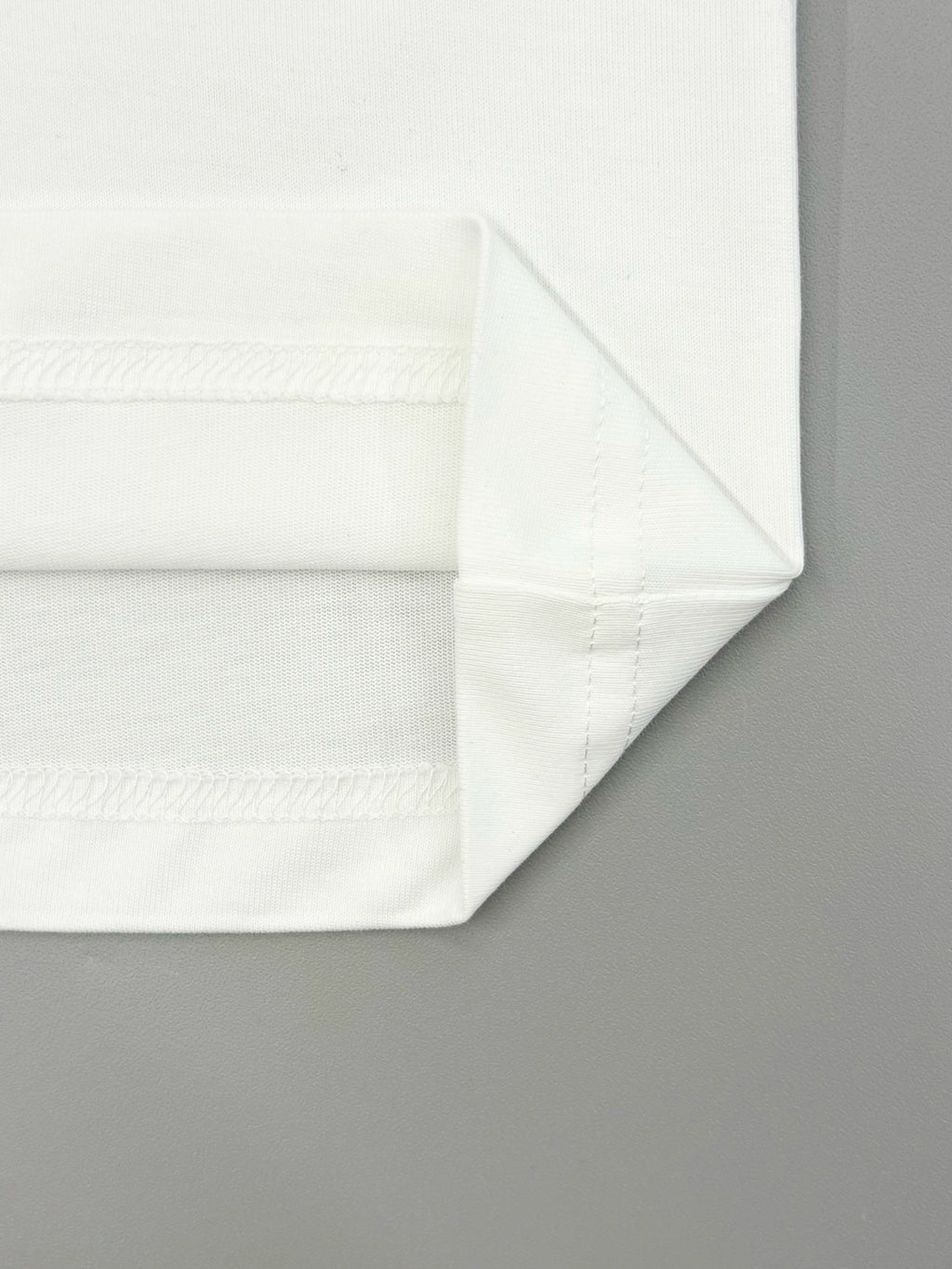 Prada short-sleeve T-shirt hem and stitched side seam detail