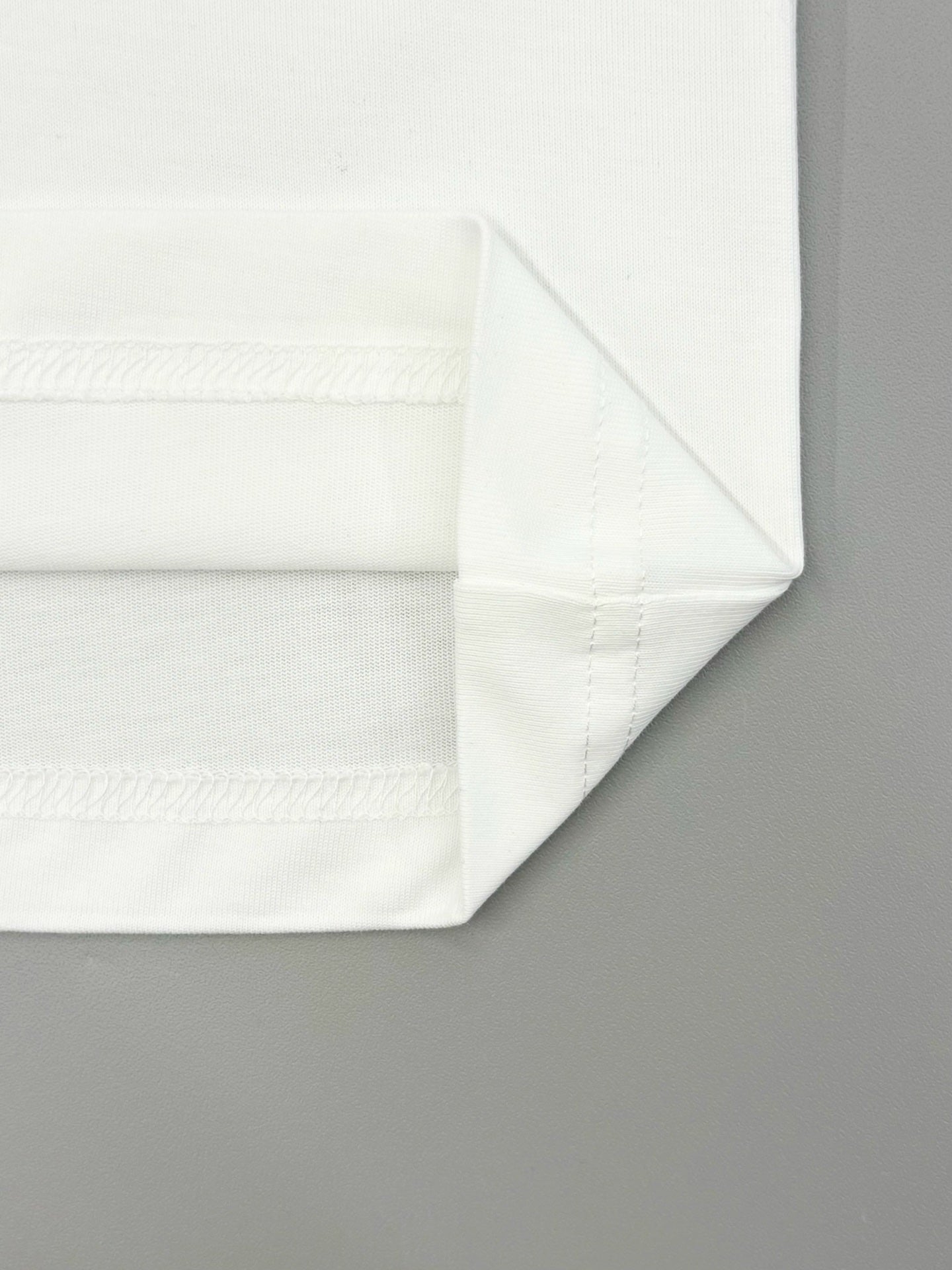 Prada short-sleeve T-shirt hem and stitched side seam detail