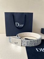 Dior belt with blue monogram strap and silver buckle, white leather back
