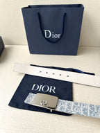 Dior belt with white leather strap, blue monogram panel, silver D buckle