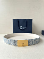 Dior belt with light blue monogram strap and gold-tone buckle