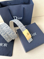 Dior belt with blue monogram strap and gold-tone buckle, beige underside