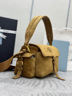 Prada suede mini shoulder bag with flap and side pockets, adjustable shoulder strap