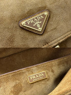 Prada logo patch on suede bag, Made in Italy leather tag