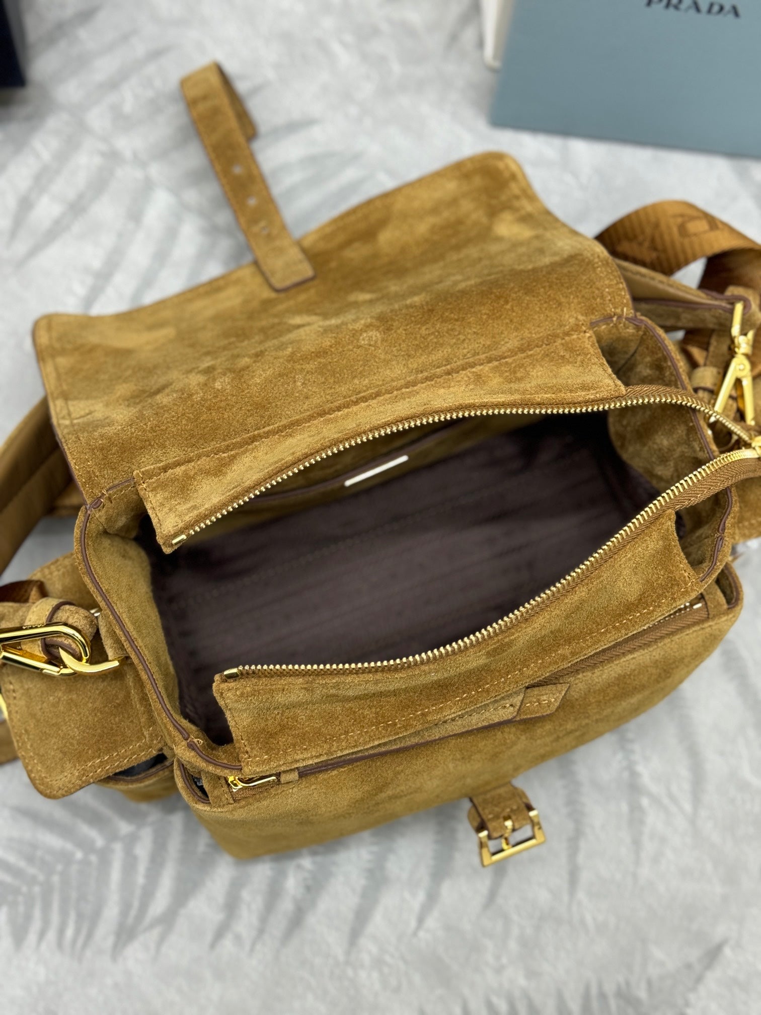Prada suede bag open close-up of interior and zipper closure