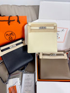 Cream leather mini handbag with front flap and silver clasp