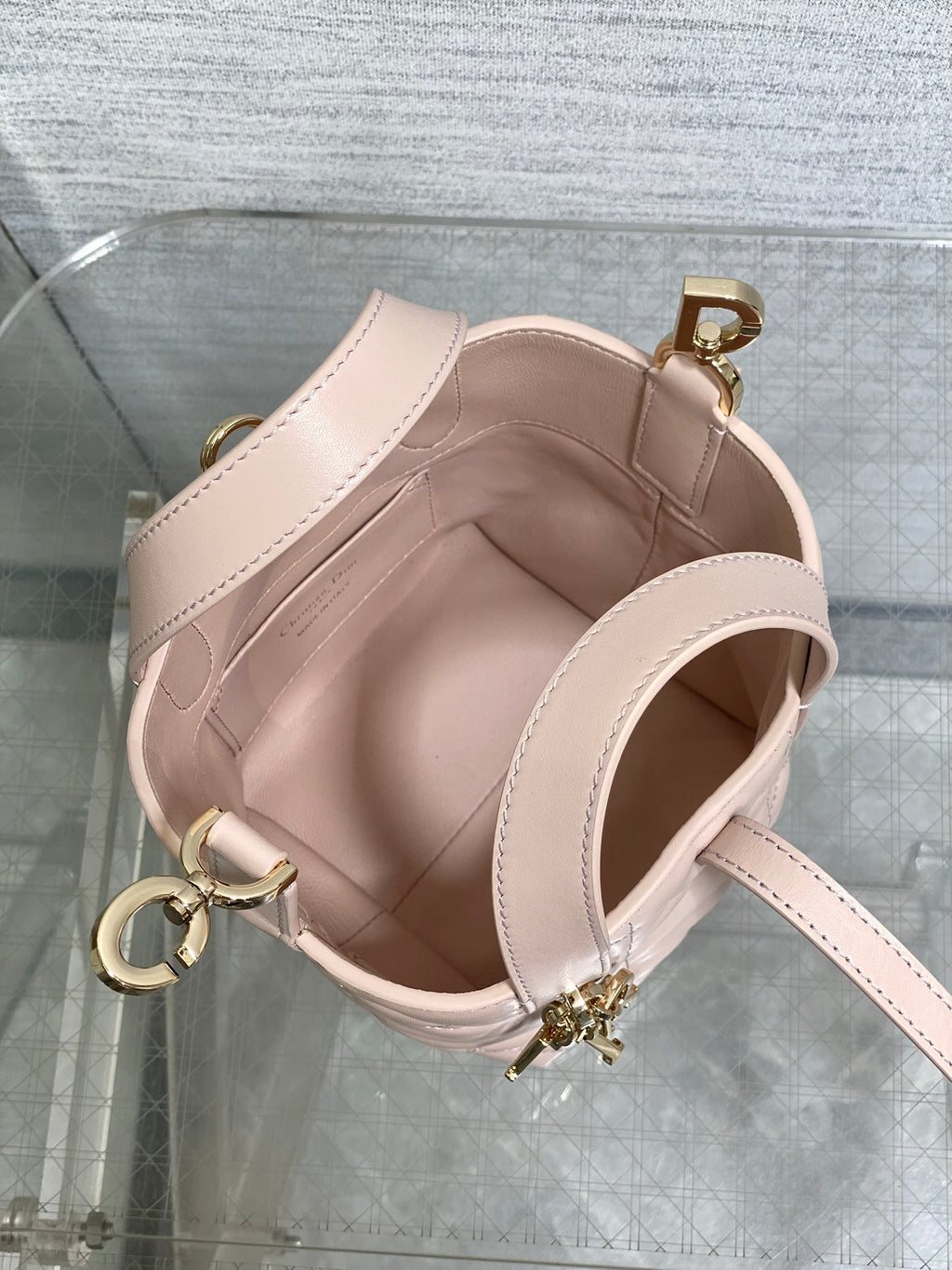 Dior quilted mini handbag open top with light pink interior and gold-tone hardware