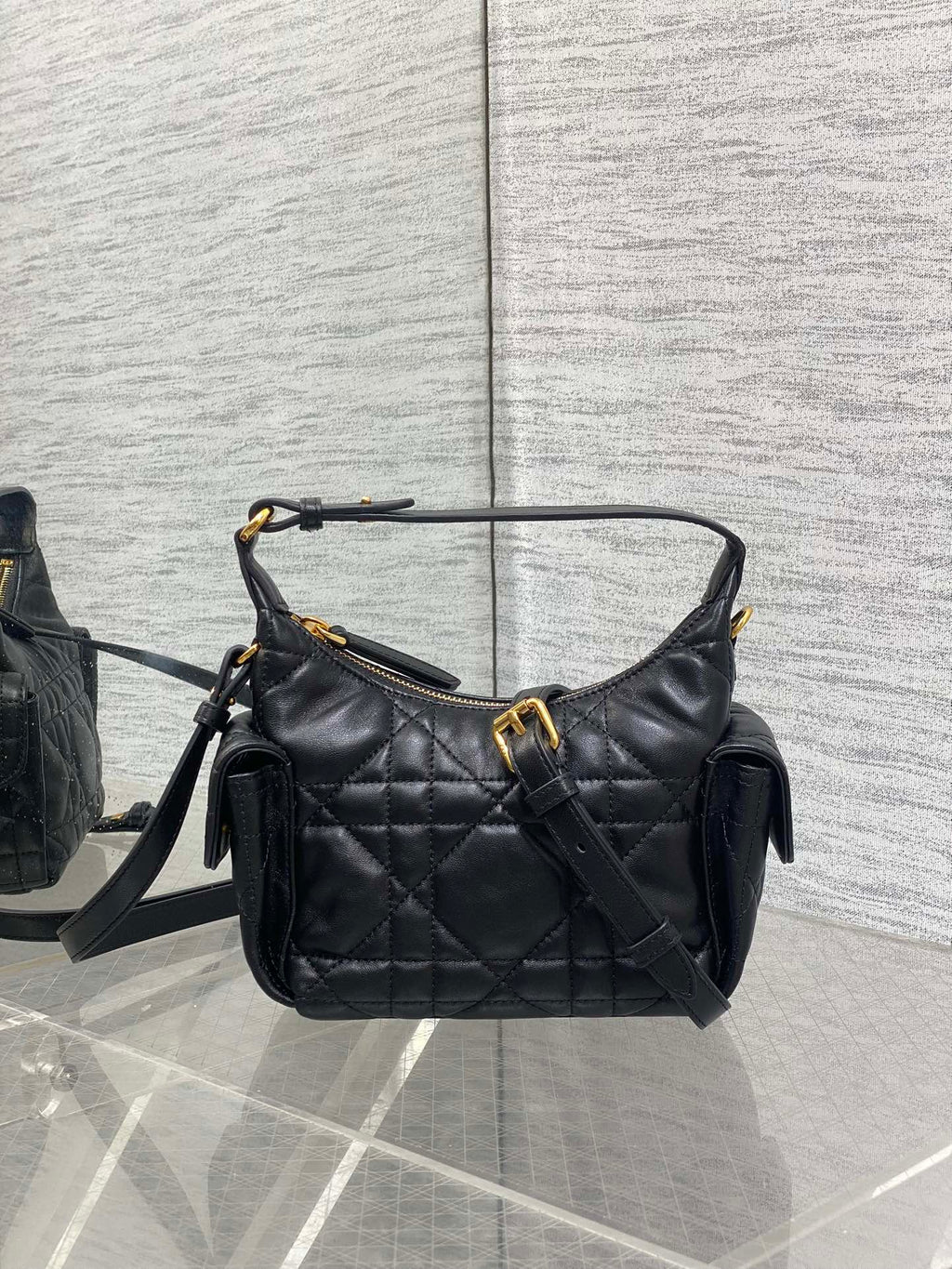 Dior quilted leather shoulder bag, black with gold-tone hardware and crossbody strap