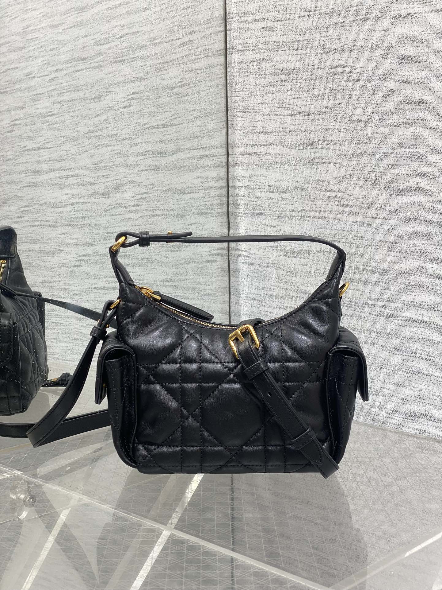 Dior quilted leather shoulder bag, black with gold-tone hardware and crossbody strap