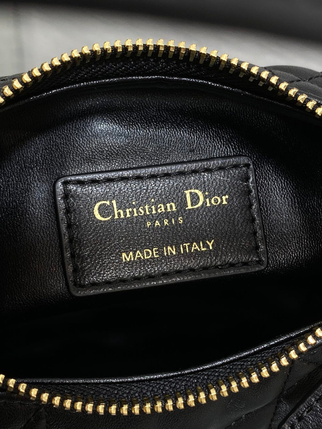 Christian Dior leather label on black bag lining, Made in Italy
