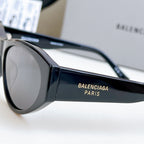 Balenciaga oversized sunglasses with black frame and dark tinted lens