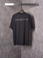 Balenciaga black short-sleeve T-shirt on hanger with BALENCIAGA back print