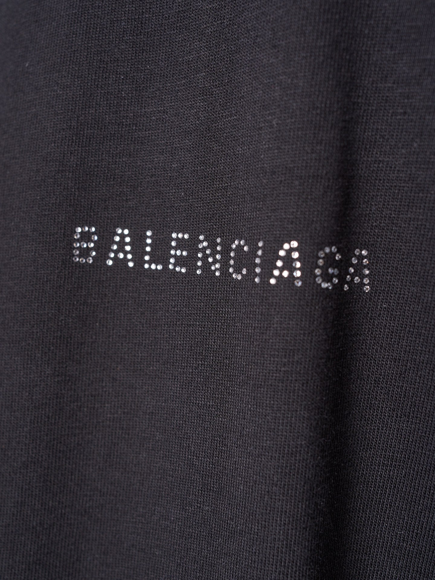 Balenciaga black T-shirt fabric with dotted logo lettering on chest