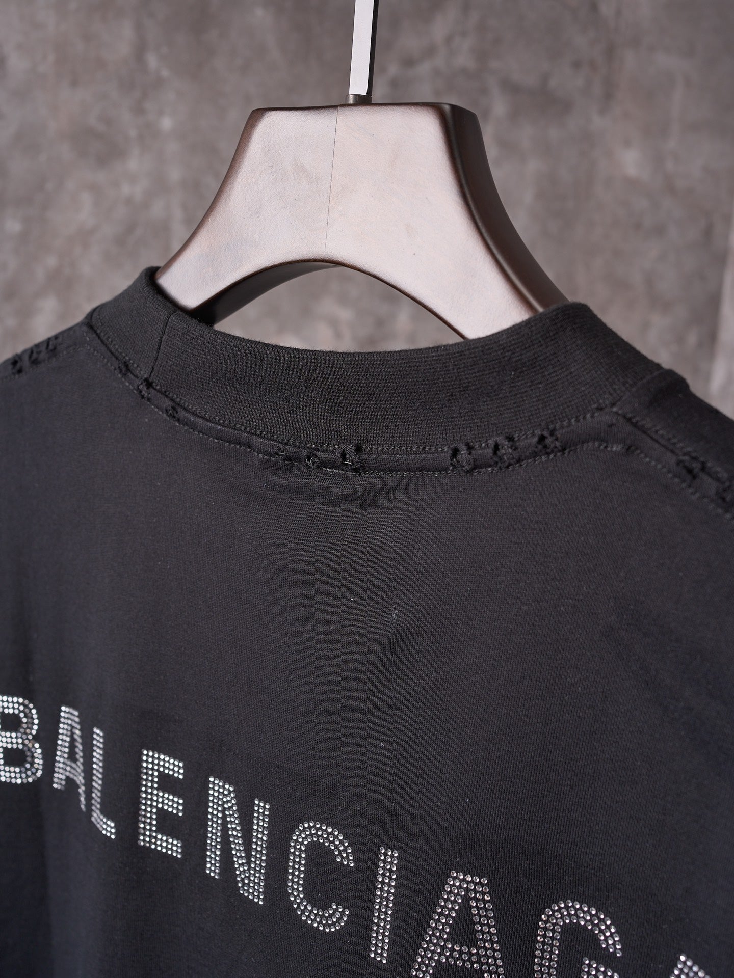 Balenciaga black crew-neck T-shirt collar with BALENCIAGA dotted lettering