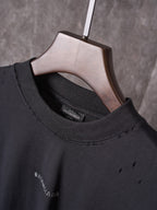 Balenciaga black crew-neck T-shirt collar with BALENCIAGA label inside