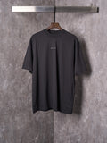 Balenciaga black short-sleeve T-shirt on hanger with small chest logo