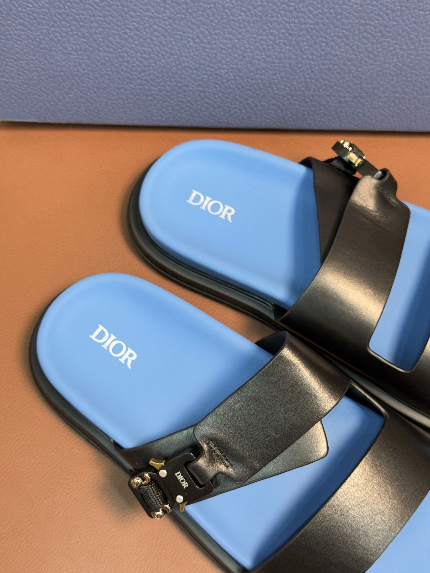 Dior slide sandals, blue footbed with two black straps and gold buckle hardware