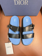 Dior luxury sandals with black leather straps and gold buckle, blue footbed