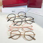 Gucci eyeglasses, assorted round metal frames with clear lenses