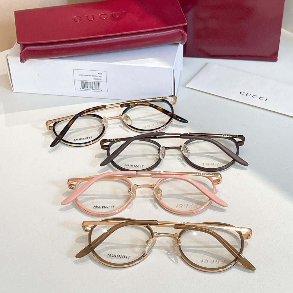 Gucci eyeglasses, assorted frames in tortoise, black, gold, and blush