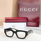 Eyeglasses with black frames and gold-tone side GG logo detail