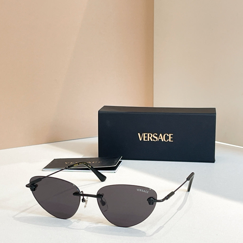 Versace sunglasses with dark tinted lenses and mixed black and gold frame, V logo
