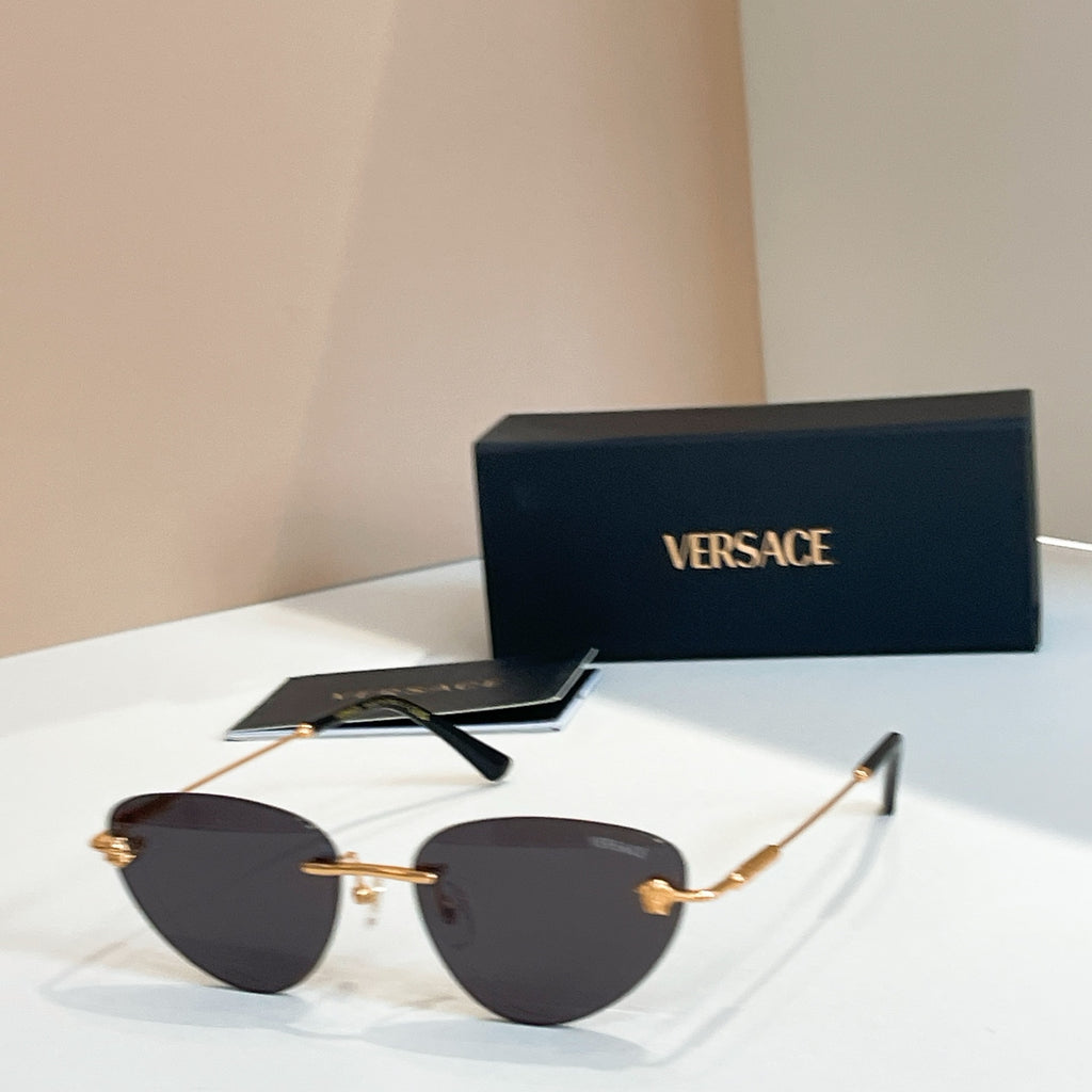 Versace sunglasses with dark tinted lenses and black-and-gold frame, V logo on arms
