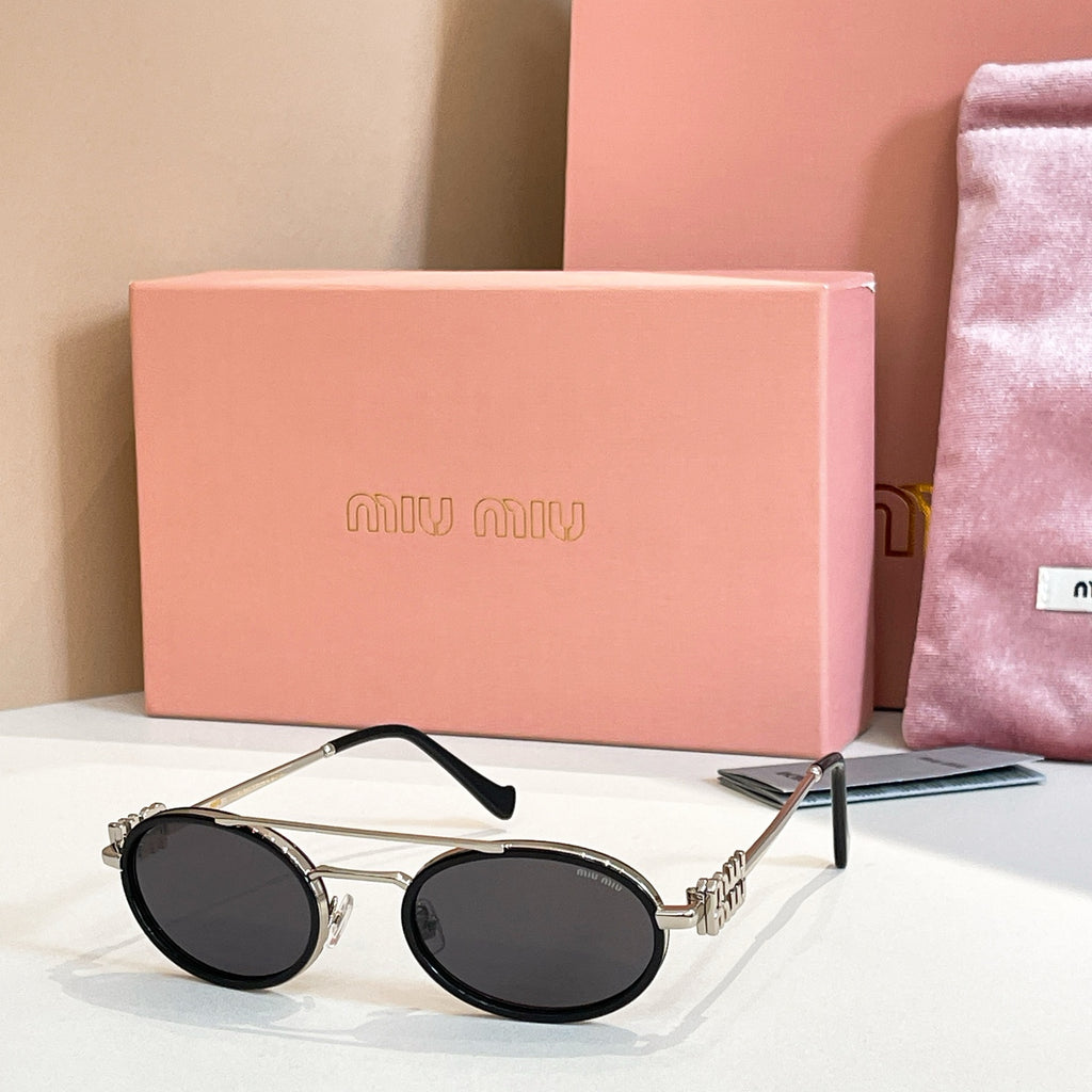 Miu Miu round sunglasses with gold frame, black lenses, black temples